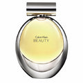 A bottle of Calvin Klein Beauty eau de parfum with a clear, golden liquid visible and the brand name displayed on the top.