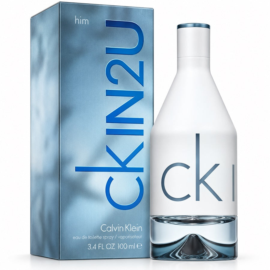Pack Image: Calvin Klein CK IN2U Him 100ml Eau de Toilette white bottle beside its metallic silver-grey presentation box with vertical CK IN2U branding on a clean white background