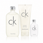 Calvin Klein CK One body wash set featuring a large frosted bottle, a tall translucent tube, and a smaller clear bottle, all with silver caps on a white background.