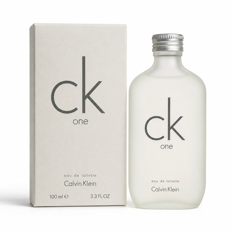 Calvin Klein CK One Eau de Toilette bottle and its matching packaging box, both in a minimalist off-white color with black logo branding.