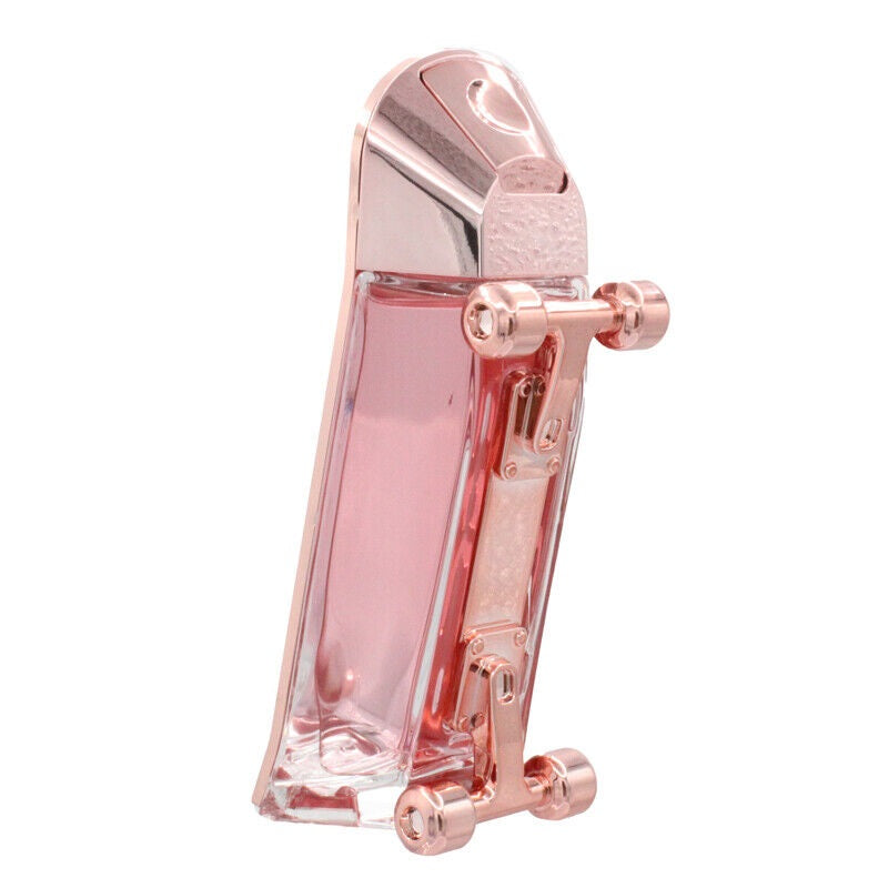 A glass bottle of 212 Heros Forever Young Her Eau de Toilette by Carolina Herrera with a pink liquid visible and a gold-colored cap.