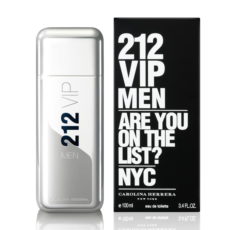 The image shows a bottle of 212 VIP Man Eau de Toilette by Carolina Herrera next to its packaging. The bottle is clear with a white label, and the packaging is black with white and silver text.