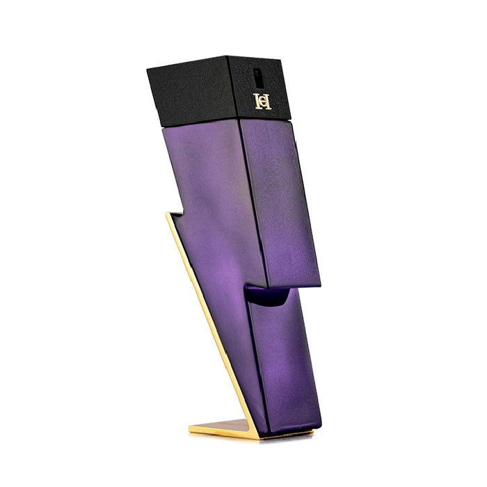 A purple bottle of Bad Boy Dazzling Garden Eau de Parfum by Carolina Herrera, designed with an abstract and geometric shape.