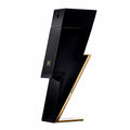 A black and gold bottle of Bad Boy Eau de Toilette by Carolina Herrera, designed in a striking lightning bolt shape.
