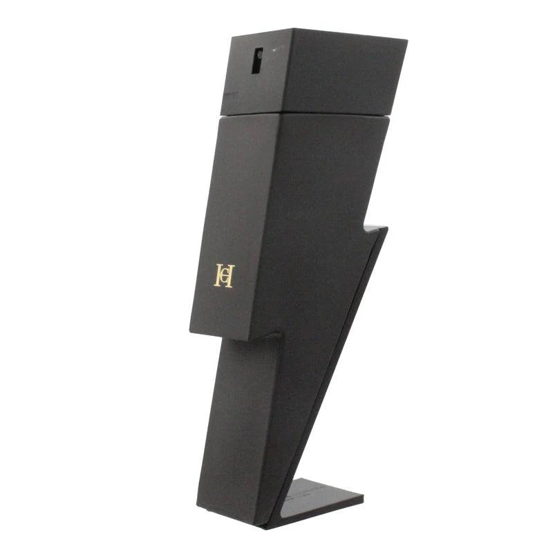 A black bottle of Bad Boy Le Parfum by Carolina Herrera, designed with a striking logo and shape.