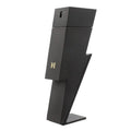 A black bottle of Bad Boy Le Parfum by Carolina Herrera, designed with a striking logo and shape.