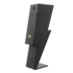 A black bottle of Bad Boy Le Parfum by Carolina Herrera, designed with a striking logo and shape.