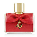 A bottle of CH Privée Women eau de parfum by Carolina Herrera with a red textured cap and a gold bow detail.