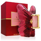 Red butterfly-shaped perfume bottle with gold accents and matching box on a white background