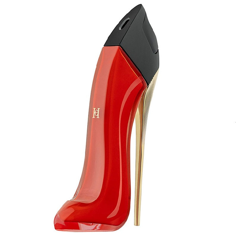 Red high-heeled shoe with gold heel on a white background
