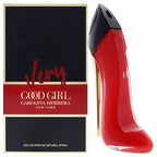 Red high-heeled shoe-shaped perfume bottle with 'Very Good Girl' packaging by Carolina Herrera on a white background.