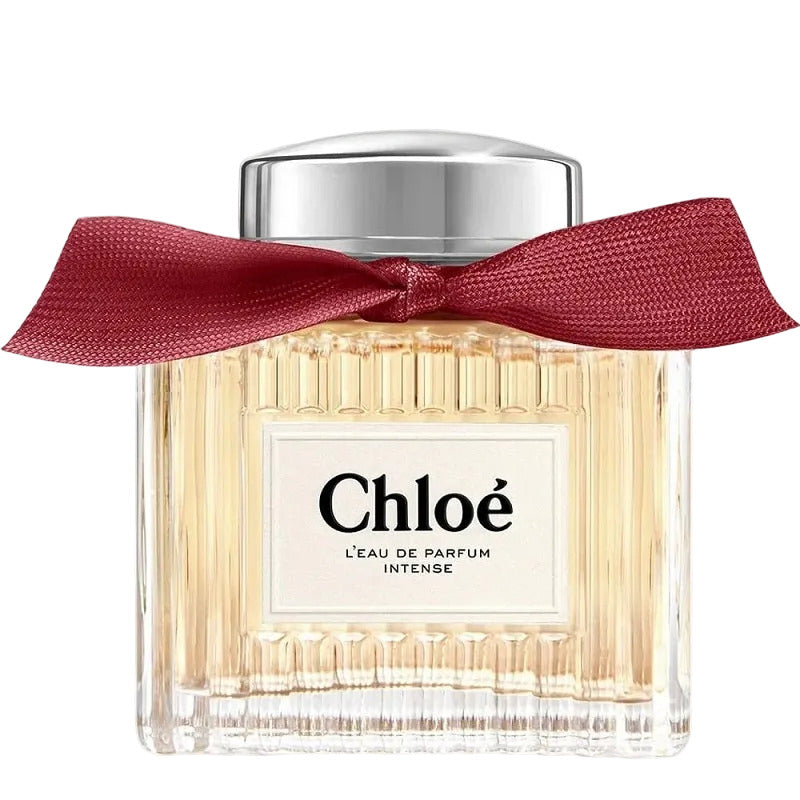 Chloe perfume bottle with a red ribbon on a white background