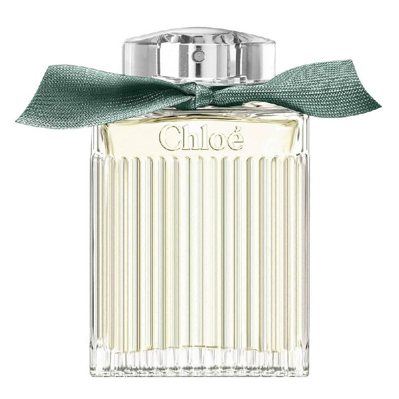 Chloe perfume bottle with a green ribbon on a white background