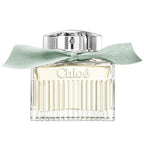 Chloe perfume bottle with a light green ribbon on a white background