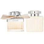 Two Chloé perfume bottles with ribbons on a white background