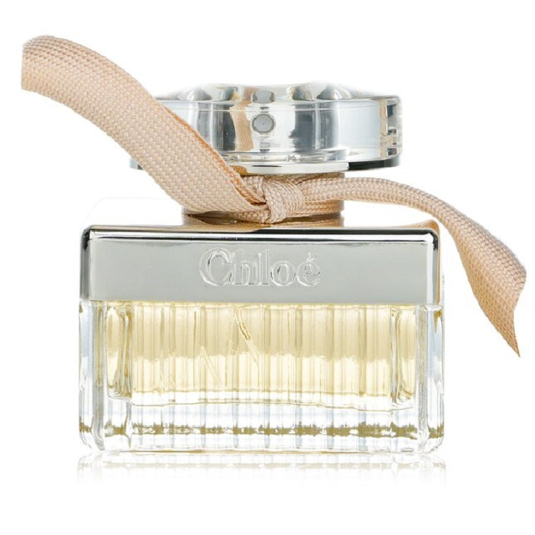 Chloe perfume bottle with a beige ribbon on a white background