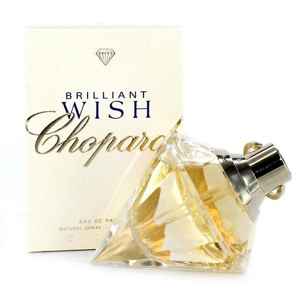 A photograph of Chopard's Brilliant Wish eau de parfum, showing the perfume bottle in front of its packaging box.