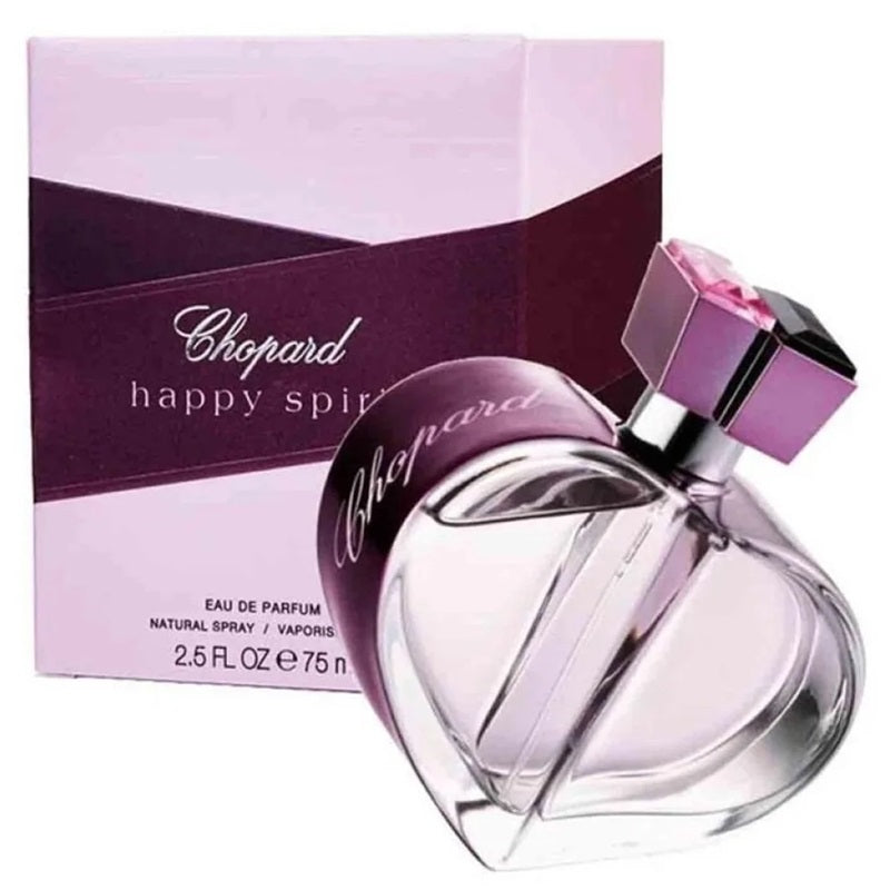 Chopard Happy Spirit Eau de Parfum bottle in front of its original packaging box. The heart-shaped clear glass bottle contains a light lavender liquid and features a metallic purple cap with a pink gemstone accent.