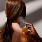 Clinique Aromatics Elixir 100ml Eau de Parfum lifestyle image inspired by timeless elegance, autumn gardens and confident feminine sophistication.