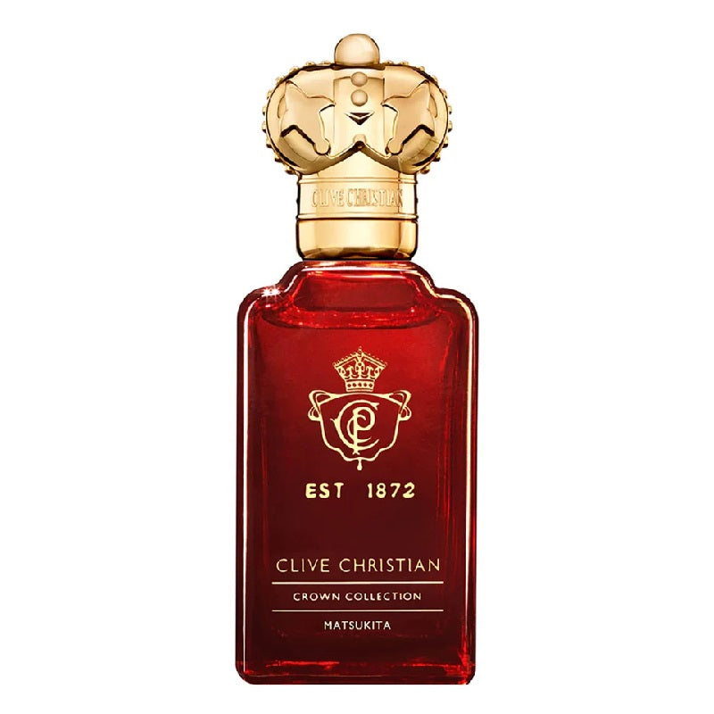 Red Clive Christian perfume bottle with gold cap on a white background