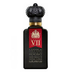 Black Clive Christian perfume bottle with red label on a white background