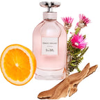 Lifestyle Image: Coach Dreams 40 ml Eau de Parfum by Coach – captured in a light and breezy desert-inspired setting evoking sunshine, movement and confident ease.