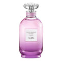 Pink perfume bottle with silver cap on a white background