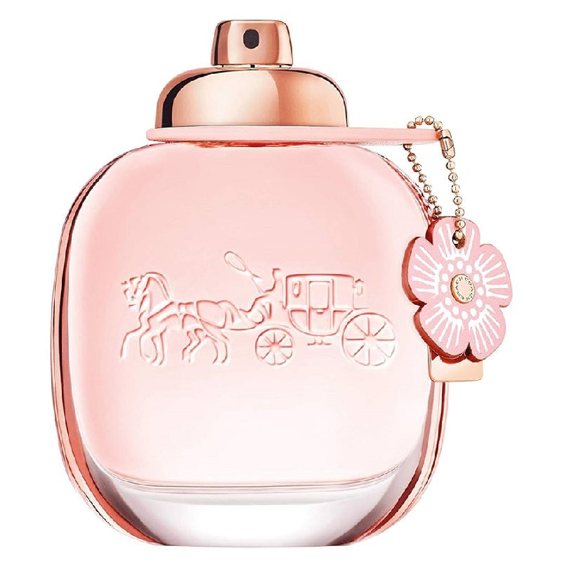 Coach Floral Eau de Parfum bottle with pink floral design and a pink charm on the cap.