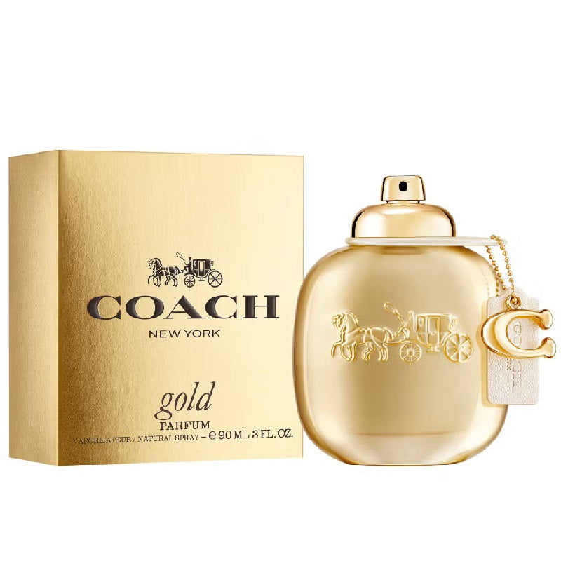 Coach New York gold perfume bottle and packaging on a white background