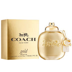 Coach New York gold perfume bottle and packaging on a white background
