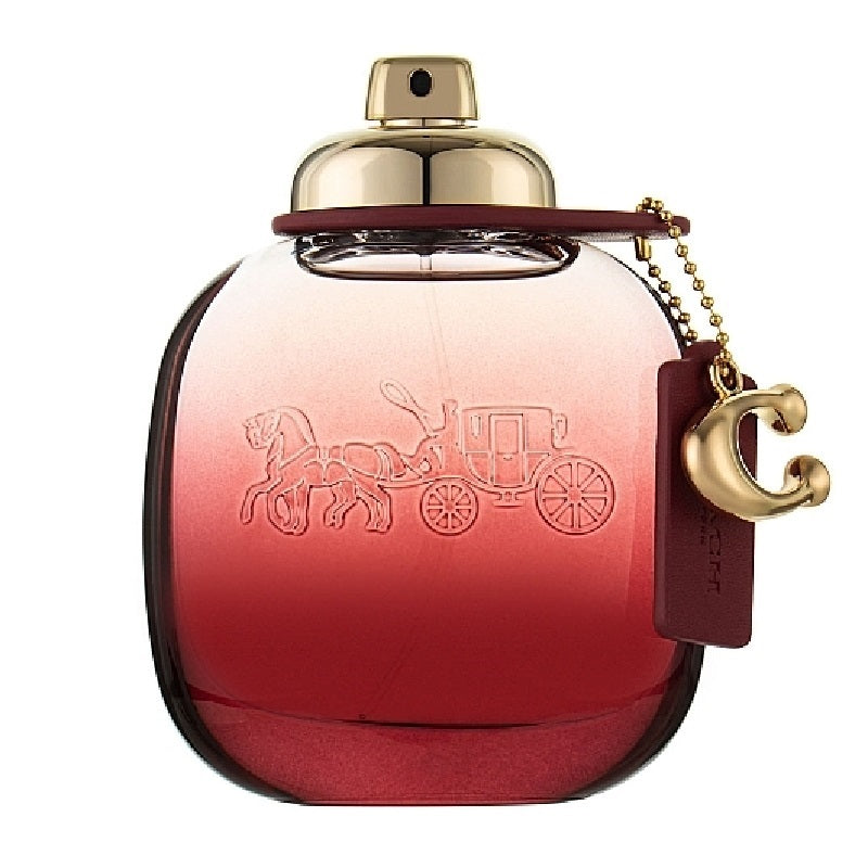 Coach perfume bottle with red and gold design on a white background
