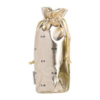 Gold and silver drawstring pouch with 'M' branding on a white background