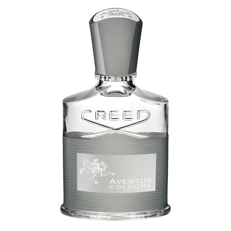 A bottle of Creed Aventus Cologne eau de parfum with a white label and decorative elements, transparent bottle showcasing the liquid inside.