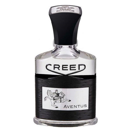 A bottle of Creed Aventus Eau de Parfum with a black cap and a label featuring a silver emblem of a horse and rider.