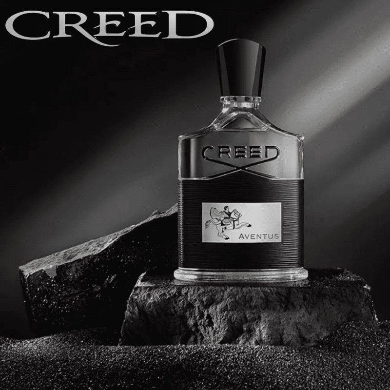 Creed Aventus perfume bottle on a dark background with 'CREED' branding.