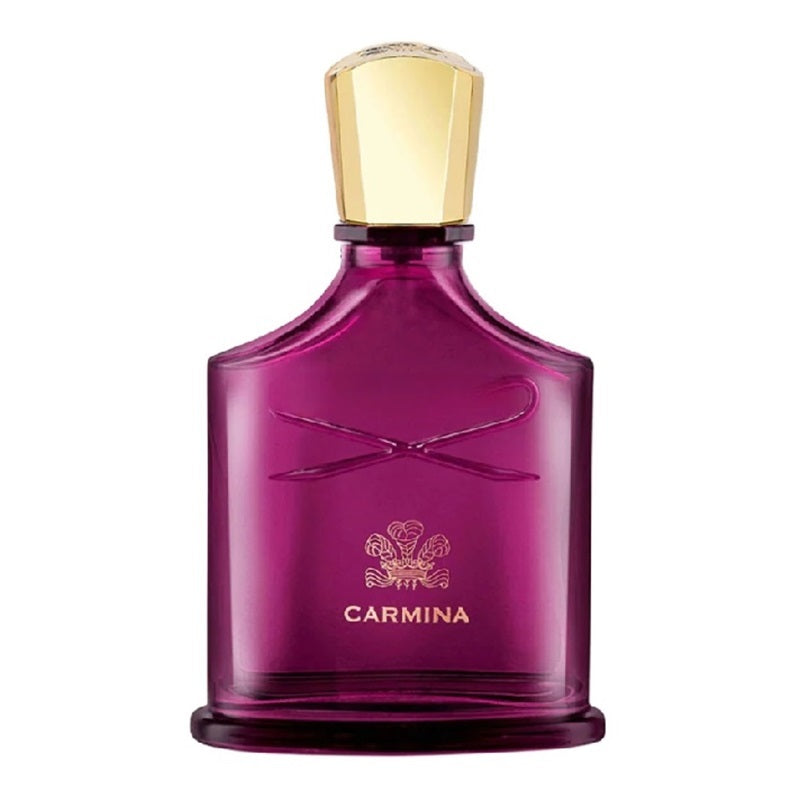 A purple glass perfume bottle with a gold cap and gold lettering that reads 'CARMINA' on the front, set against a plain white background.