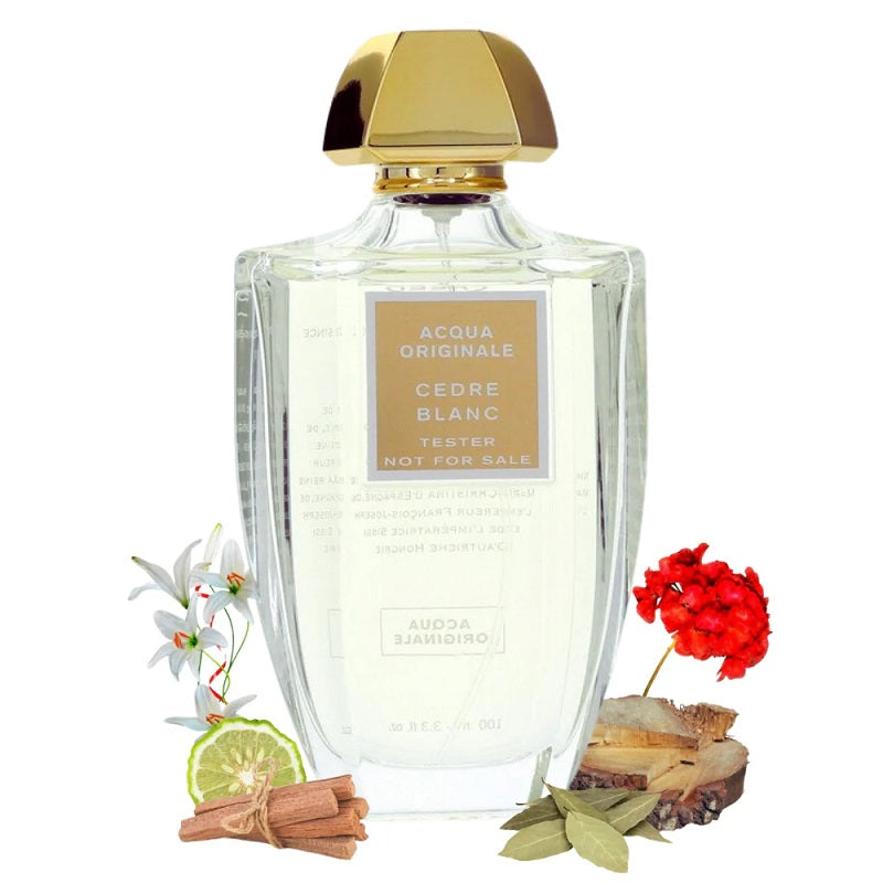 Perfume bottle with gold cap and floral elements on a white background