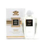 A bottle of Cedre Blanc Eau de Parfum by Creed, with a white and gold box in the background.