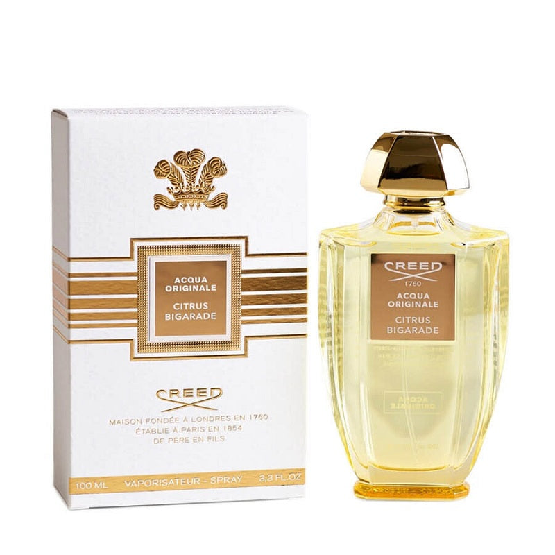 Creed perfume bottle and packaging on a white background