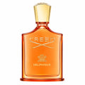 Creed Delphinus Eau de Toilette bottle in amber glass with a gold cap and gold lettering, shown on a plain white background.