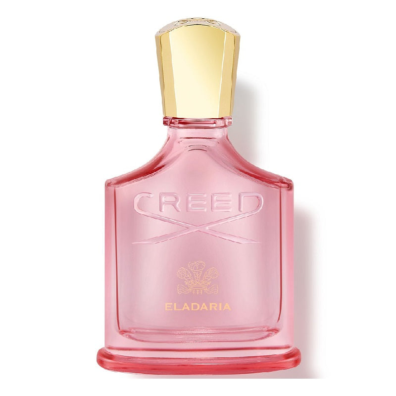 Pink Creed Eladaria perfume bottle with gold cap on a white background
