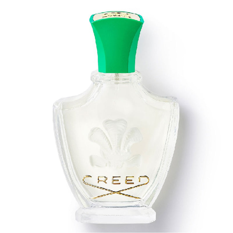 Creed perfume bottle with green cap on a white background