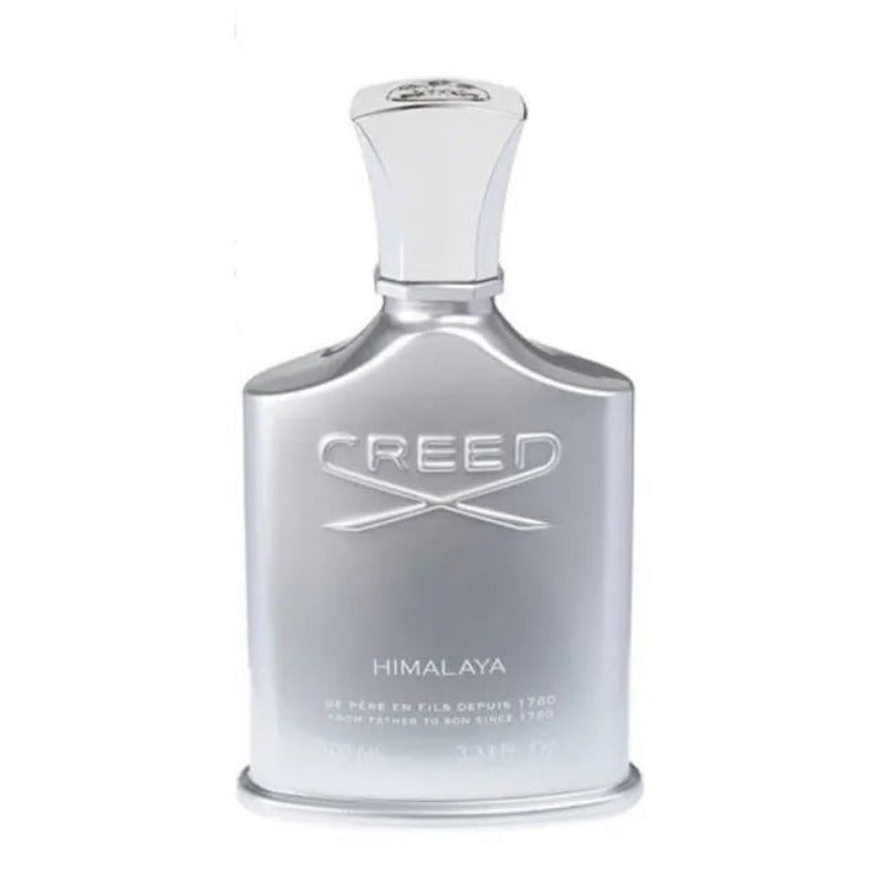 A bottle of Creed Himalaya Eau de Parfum with a white label and cap, prominently displaying the brand's logo.