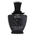 A black bottle of Love In Black Eau de Parfum by Creed with white text and floral design.