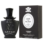 A black bottle of Creed Love In Black Eau De Parfum with a matching black box, displaying the product name and branding.