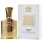 A bottle of Creed Millesime Imperial eau de parfum, with a gold-colored label and cap, alongside its white packaging box.