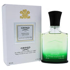 A bottle of Creed Original Vetiver eau de parfum alongside its white packaging box with gold accents. The bottle is green with a black cap, and the packaging indicates a 50ml volume.