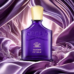 Creed Queen of Silk 75 ml perfume bottle styled on dark wood surface with soft lighting and silk fabric