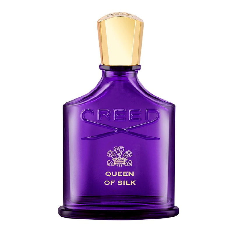 A purple glass bottle of Creed Queen of Silk eau de parfum with a gold cap.