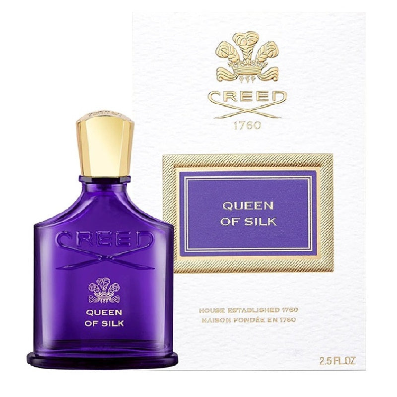 Creed Queen of Silk 75 ml perfume bottle next to matching amethyst and gold presentation box